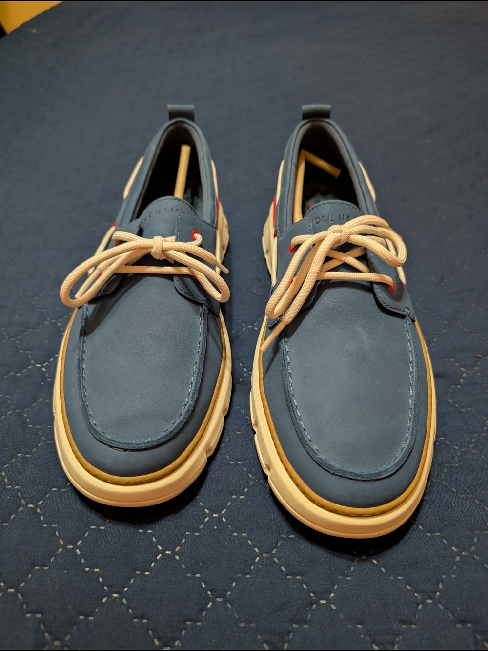 Cole Haan women's Navy Boat Shoes with Cream Laces